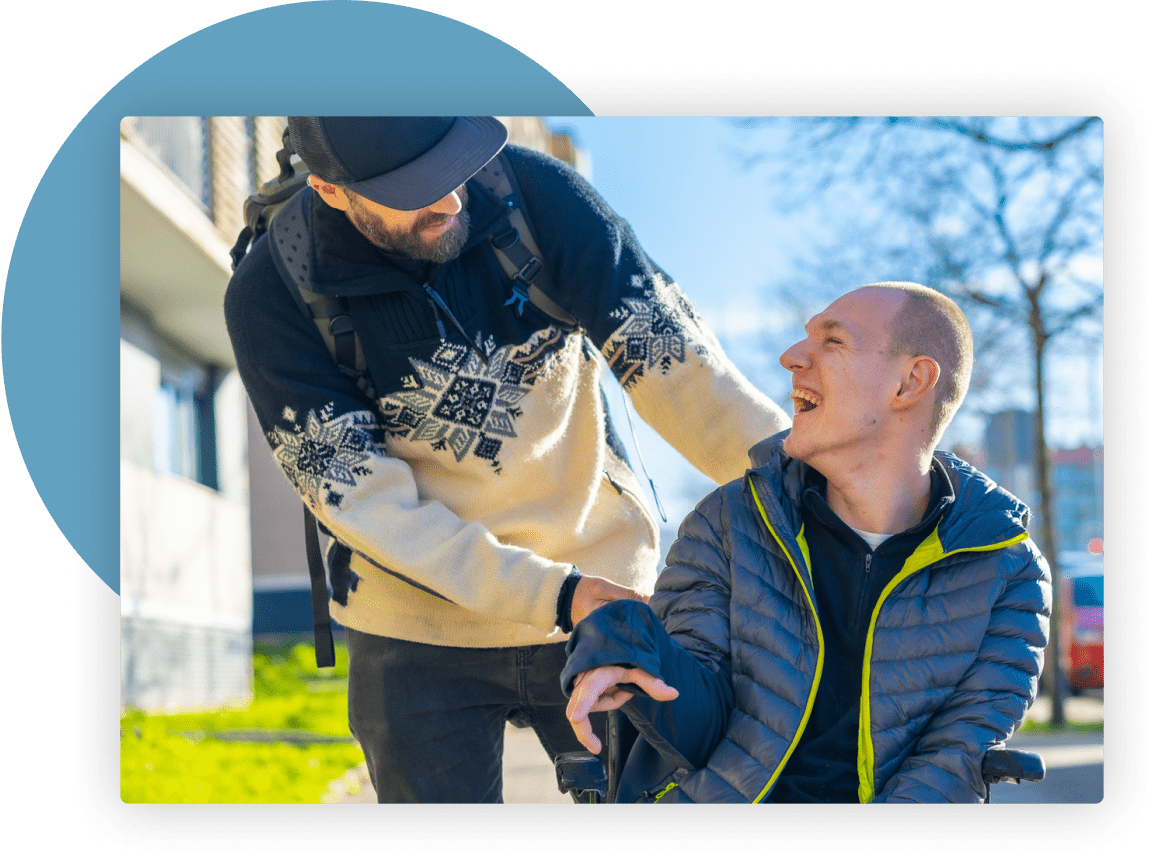 man with disability with caregiver