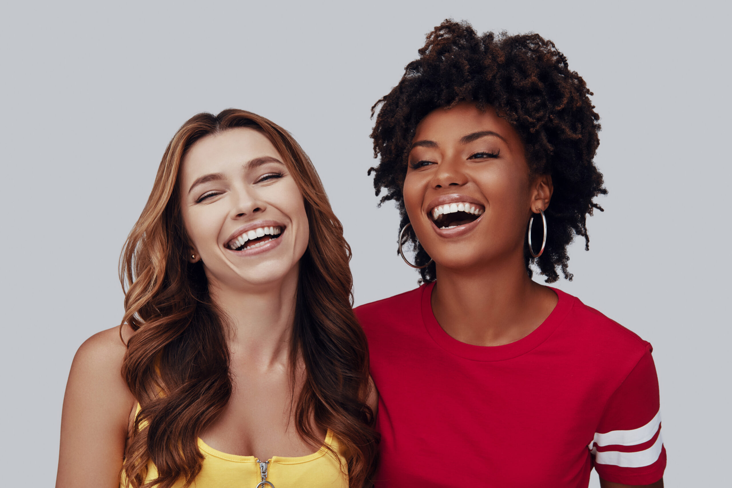 Two woman smiling